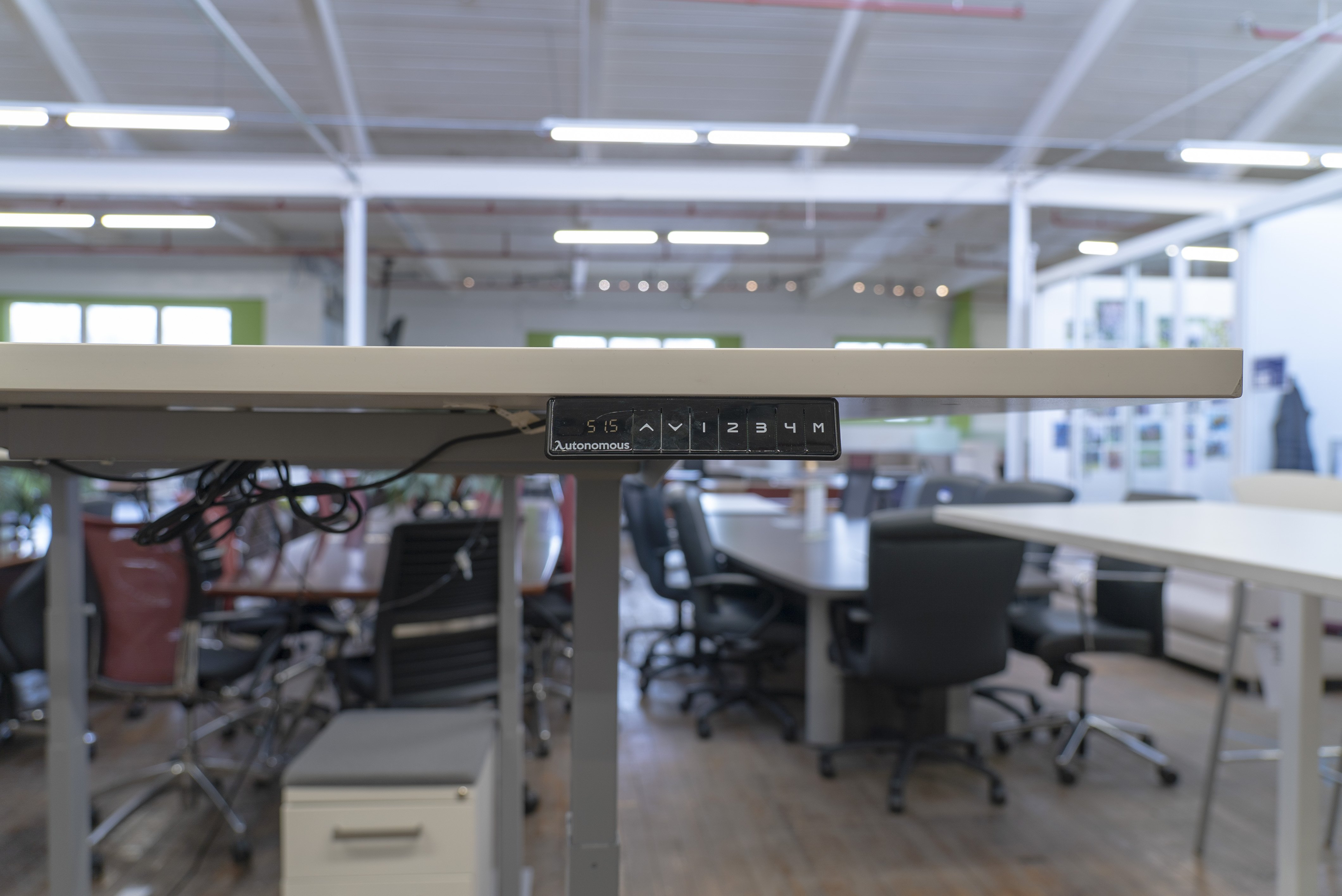 autonomous-crescent-shaped-height-adjustable-sit-to-stand-desks