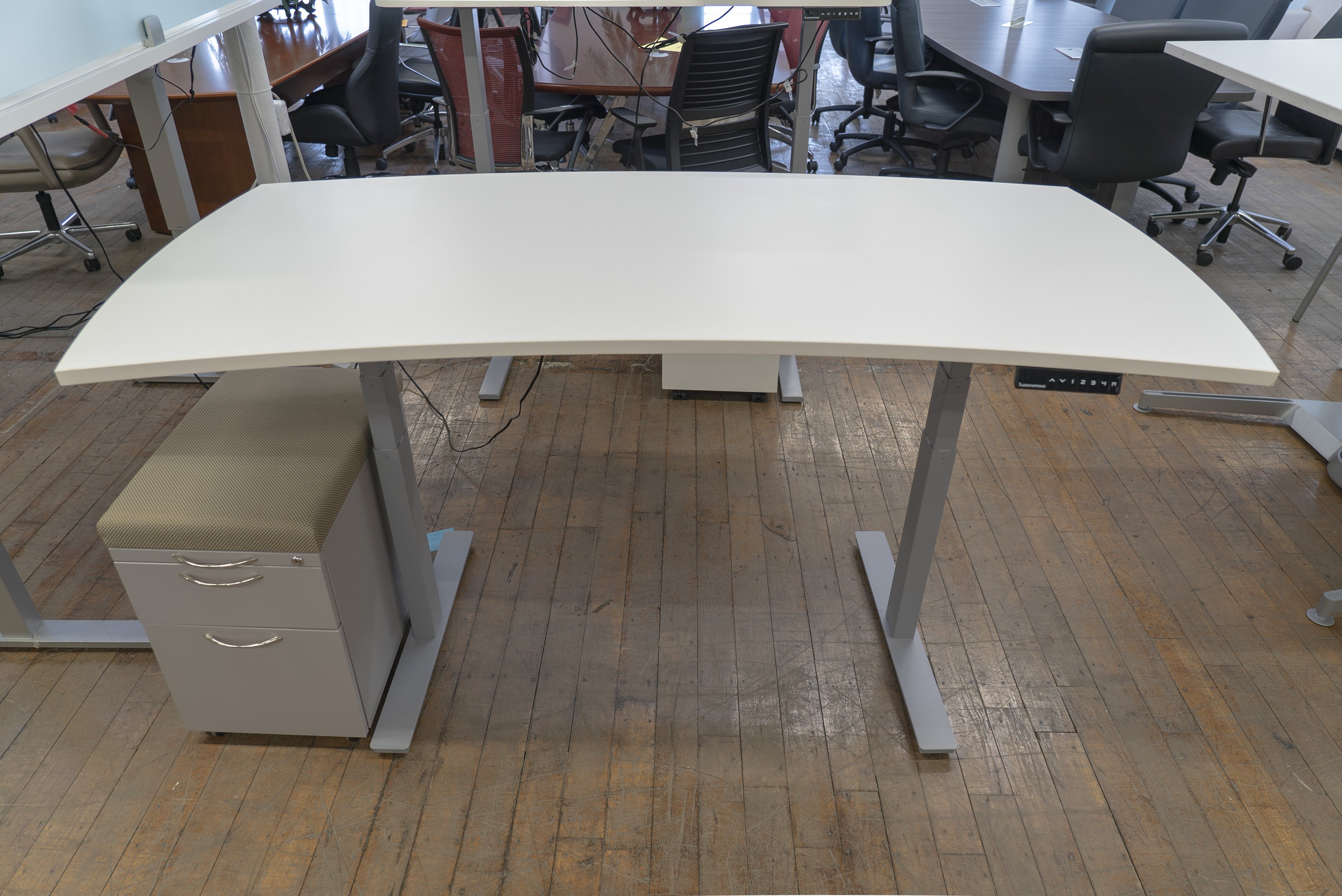 autonomous-crescent-shaped-height-adjustable-sit-to-stand-desks