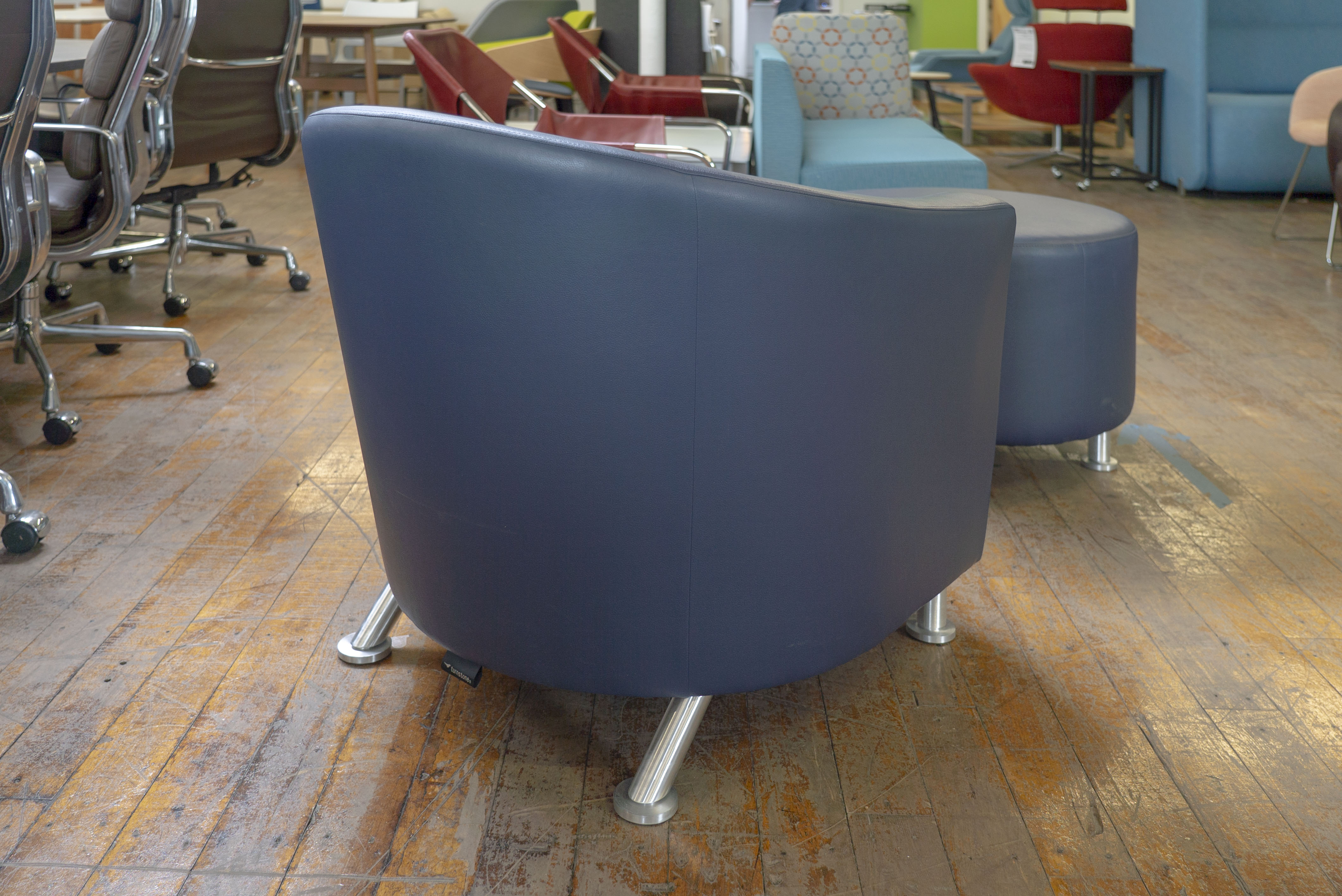 turnstone-jenny-round-low-with-matching-alight-ottoman-in-blue-leather