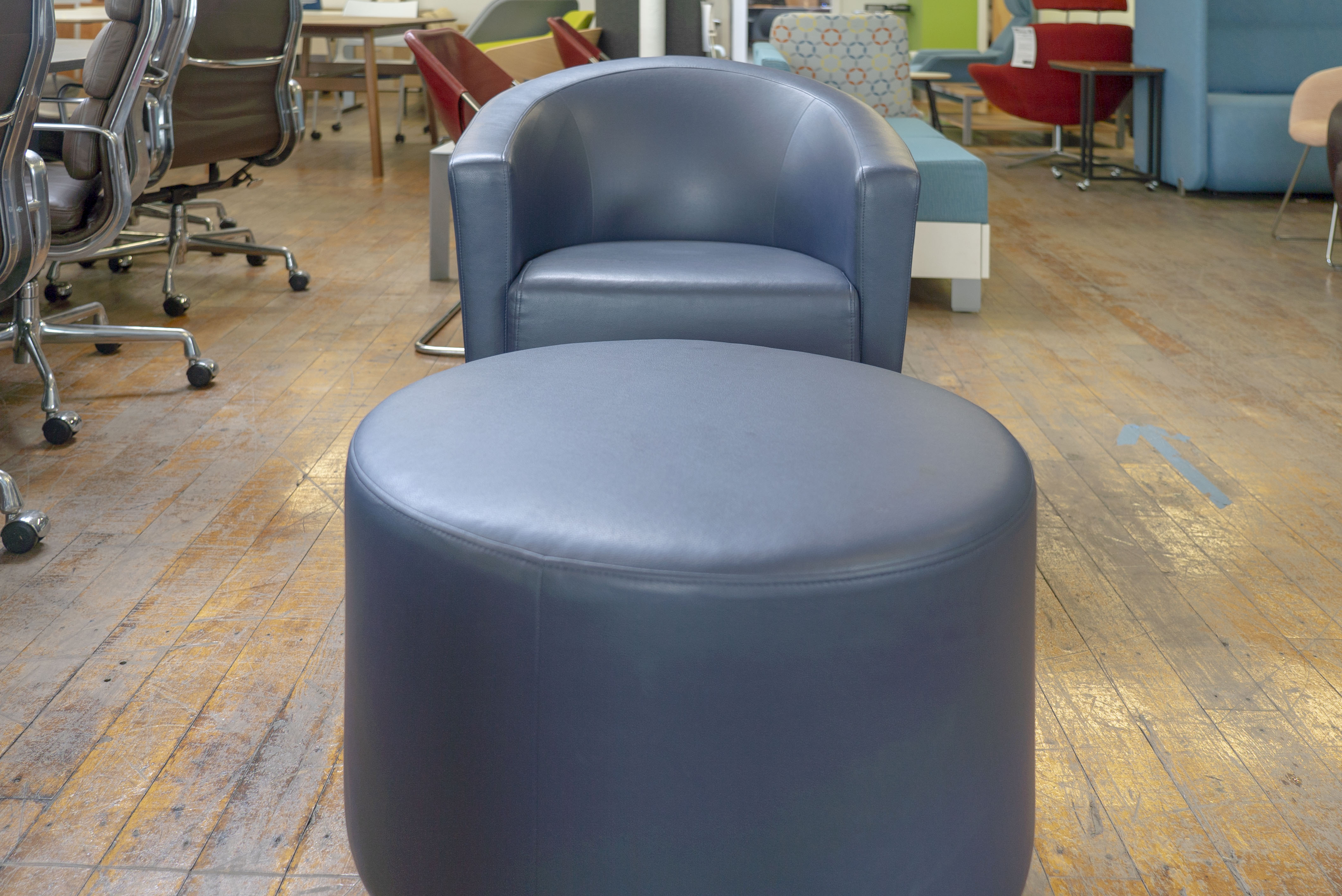 turnstone-jenny-round-low-with-matching-alight-ottoman-in-blue-leather
