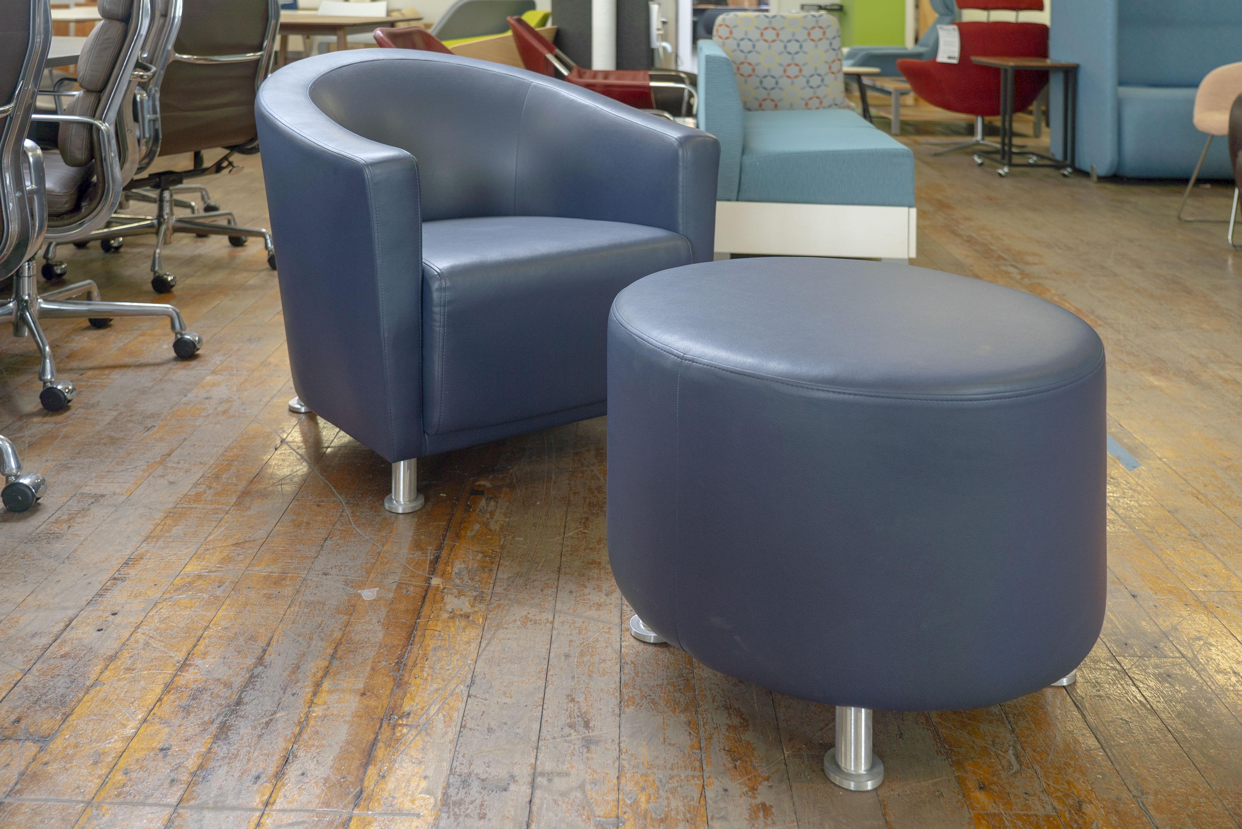 turnstone-jenny-round-low-with-matching-alight-ottoman-in-blue-leather